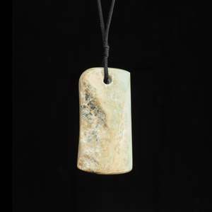 Hei Toki hand carved jade pendant by Nick and Mady