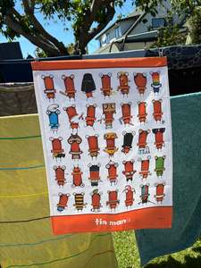 Merchandise: Tin Mania - Tea Towel