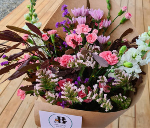 Products: flowers -$70 The Barefoot Florist
