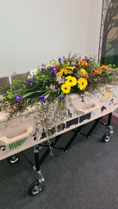 Products: Casket spray -$500 The Barefoot Florist