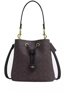 Rowan Bucket Bag In Signature Canvas (Im/Walnut/Black)