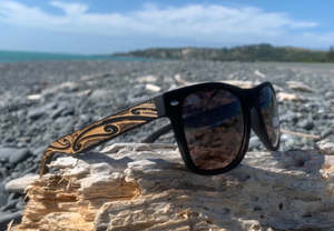 Sunglasses with kowhaiwhai patterned arms by Miriama Grace-Smith.