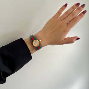 Gucci Skeleton Web Plexiglass Bangle Watch