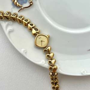Bridal Watches: Seiko Gold Toned Women's Watch with Hearts Bracelet