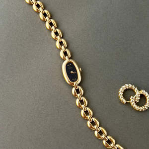 Seiko Gold Toned Capsule Woman's Watch