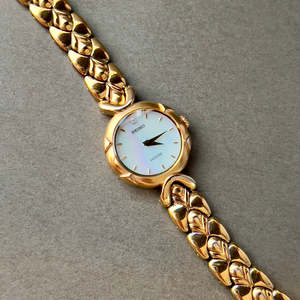 Bridal Watches: Seiko Exceline Gold Toned Woman's Watch with Radiant Mother of Pearl Dial