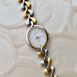 Seiko Lucent Woman's Watch with a Pink Pearlescent Dial