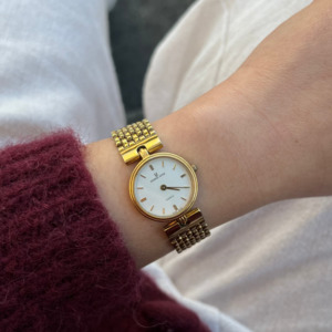 Universal Geneve Gold Bracelet Women’s Watch with Textured Dial