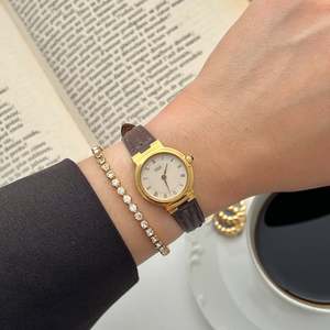 Birth Year Watches 1993: Seiko Gold Toned Sculpted Woman's Watch