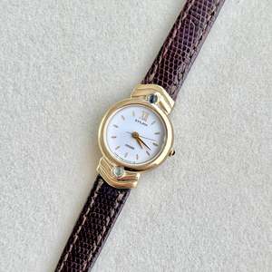 Citizen Gold Toned Women's Watch with Blue Stone
