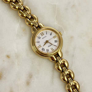 Seiko Belfina Gold Toned Round Woman's Watch