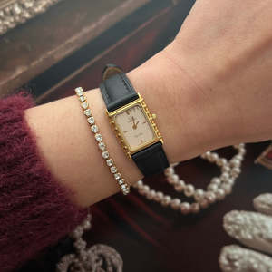 Omega De Ville Gold Women’s Watch with Patterned Champagne Dial