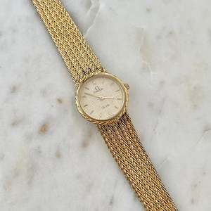 Omega Ladies Watches: Omega De Ville Laurel Case Woven Bracelet Watch