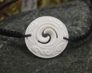 Bone Carvings Nz: Bone Adjustable Cord Koru Bracelet (BM786)