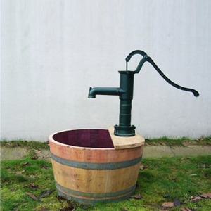 Rustic: Cast Iron Ornamental Water Pump for Oak Wine Barrel