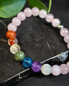 Crystals: 8mm Rose Quartz  7 Chakra Bead Bracelet