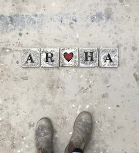 Words: Aroha tiles black and white