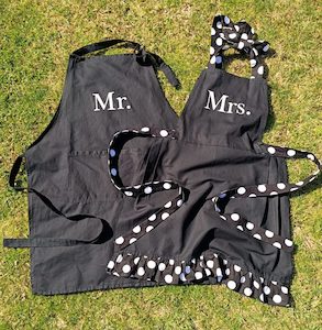 Products: Mr & Mrs Aprons Hire - The Party Godmother