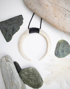 Charlie Marsh: Double Tusk Pendant