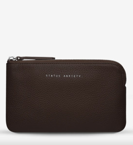 Wallets And Clutches: Smoke and Mirrors in Cocoa by Status Anxiety