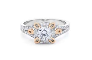 Loupe: Brilliant Cut Diamond Halo Ring