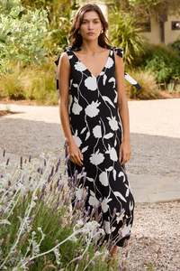 Vogue Dresses: STORIES BE TOLD SPONTANEOUS BLACK AND WHITE FLORAL TIE SHOULDER RELAXED MIDI DRESS