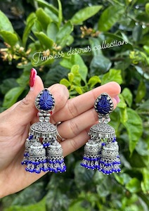 German Silver Oxidised Jewellery: Blue Jhumka drop earrings in oxidised look in silver