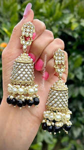 Black pearl loaded kundan Jhumka earrings