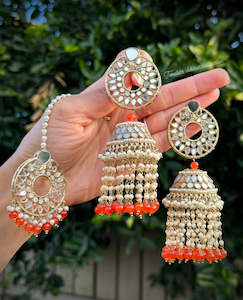 Orange pearl drop Jhumka earrings and tikka set in mirror