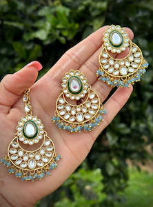 Sky blue earrings and tikka set in Kundan