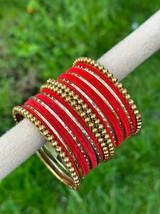 C Red Colour Jewellery Options: Red velvet bangles set with golden beaded kangan’s