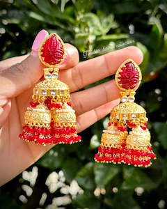 C Red Colour Jewellery Options: Red Jhumka drop earrings with curving stone in 22 KT gold plating ( high quality )