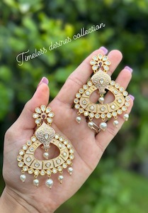 Stunning Tiyani Kundan Gold Plated earrings in peachy golden