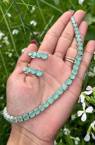 Mint Green Colour Jewellery Options: Mint green colour American diamond necklace set in silver