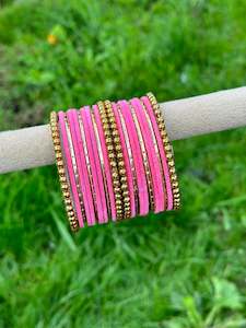 Baby pink velvet bangles set with golden beaded kangan’s