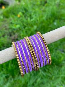 Lavender Purple velvet bangles set with golden beaded kangan’s