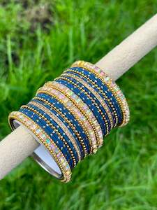 C Blue Colour Jewellery Options: Blue colour bangles with shiny golden kangan’s ( set of both hands )