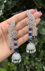 Blue long American diamond Jhumka earrings in silver