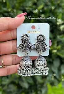Silver look jhumka earrings in oxidised