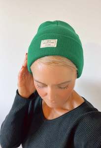 Scarves: Green beanie with a patch