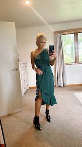 40 Dresses: Emerald green ruffle hem twist detail one shoulder dress