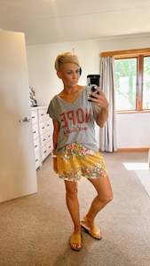 Elastic waist floral print mustard shorts