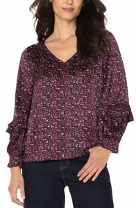 Long sleeve blouse with ruffles
