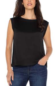 Sleeveless woven to knit top