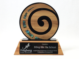 Gifts: Acrylic and Rimu Veneer Koru with inset Pāua on Rimu Base