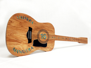 Products: Acoustic Guitar 21st Key – Rimu with Pāua Inlay