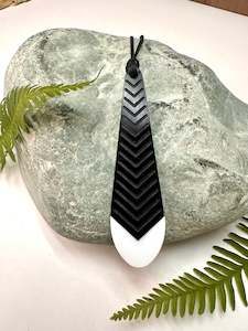 Earrings: Huia Feather Pendant