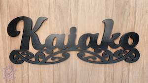Signs: Kaiako sign carved of wood