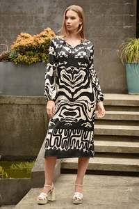 Spring 2026: COOPER PUTTING IN A SHIFT DRESS