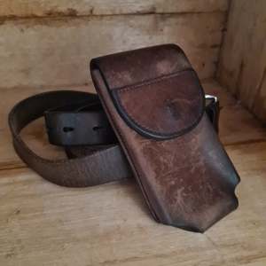 Vintagepickers Man Cave Memoribelia: Vintagepickers vintage leather belt & pouch.